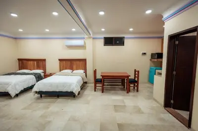 Cama o camas de una habitación en Casa Margarito Jalatlaco
