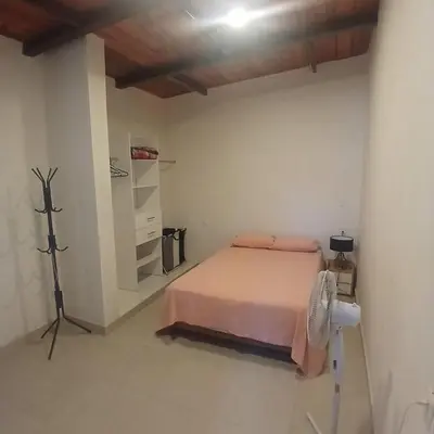Cama o camas de una habitación en The Magic