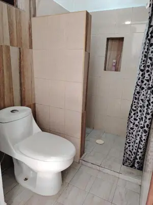 Un baño de Cuatro Rumbos Hospedaje