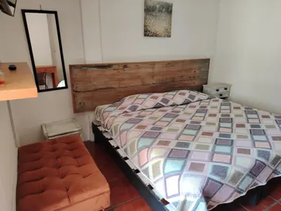 Cama o camas de una habitación en Cuatro Rumbos Hospedaje