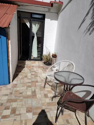Un patio o zona al aire libre en Cuatro Rumbos Hospedaje