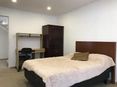 Cama o camas de una habitación en Residencia Centro Expositor-Feria-Centro-Los Fuertes