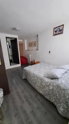 Cama o camas de una habitación en Casa de los abuelos Cholula