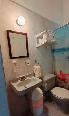 Un baño de Vista a la bahia de Acapulco - Departamento para grupos de hasta 8 huéspedes