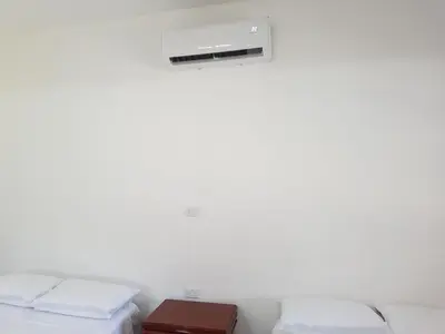 Cama o camas de una habitación en Villa Ema en Villas Camino Real cerca de las dunas de Chachalacas