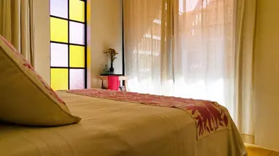 Cama o camas de una habitación en El Diablo y La Luna B&B by El Diablo y La Sandia