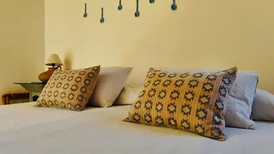 Cama o camas de una habitación en El Diablo y La Luna B&B by El Diablo y La Sandia