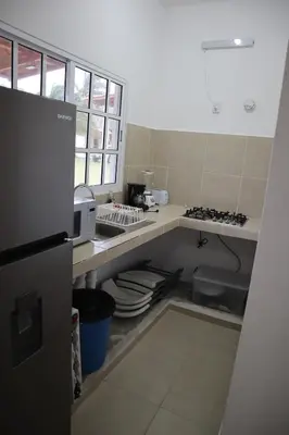 Una cocina o zona de cocina en Villa Regina en Villas Camino Real cerca de las dunas de Chachalacas