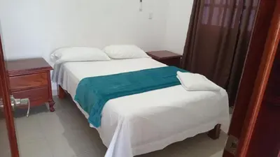 Cama o camas de una habitación en Villa Josefa en Villas Camino Real cerca de las dunas de Chachalacas