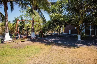 Jardín al aire libre en Villa El Lago en Villas Camino Real cerca de las dunas de Chachalacas