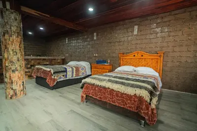 Cama o camas de una habitación en Alojamiento en Zacatlán