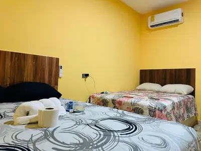 Cama o camas de una habitación en Hospedaje chachalacas