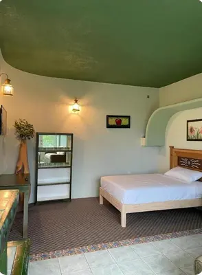 Cama o camas de una habitación en Departamentos paraiso de adan