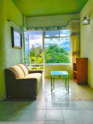 Zona de estar de Departamentos paraiso de adan