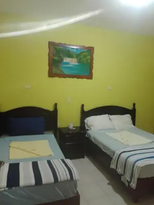 Cama o camas de una habitación en Hotel Posada Real