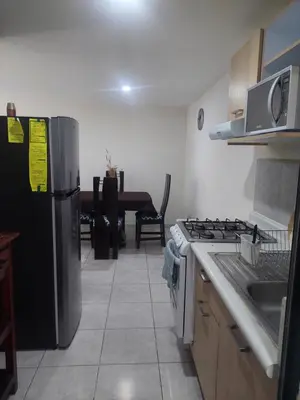 Una cocina o zona de cocina en A solo 10 min de Aeropuerto de la de la CDMX y Estadio GNP Vigilancia 24 horas