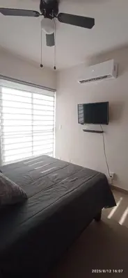 Cama o camas de una habitación en El paraíso del descanso