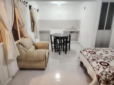 Cama o camas de una habitación en Hotel Los Ajolotes