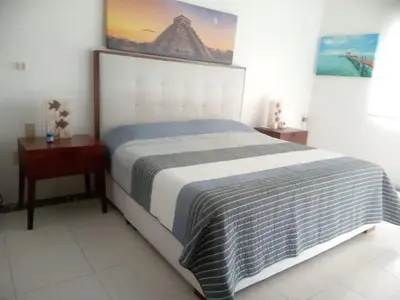 Cama o camas de una habitación en Hermosa Villa en Xcaret, Acapulco Diamante, Vidanta