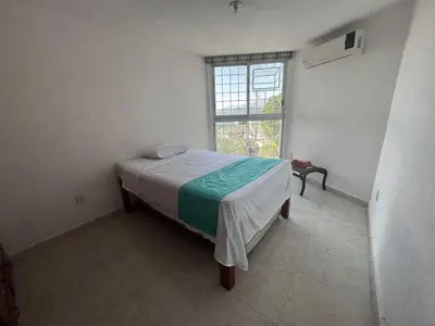 Cama o camas de una habitación en Comodo departamento cerca de Costera Acapulco