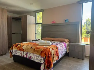 Cama o camas de una habitación en Hogar Periférico Sur