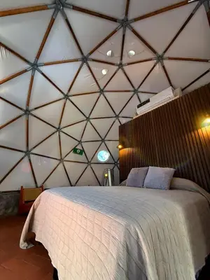 Cama o camas de una habitación en Alma Glamping