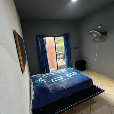 Cama o camas de una habitación en Casa con alberca en Morelos