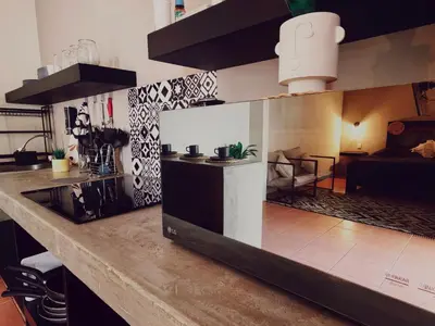 Una cocina o zona de cocina en jalatlaco estudio de lujo y garage