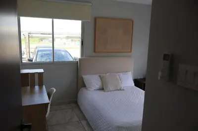 Cama o camas de una habitación en Brisa Marina Departamento con Alberca y Playa