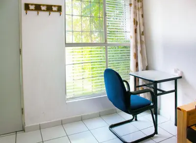 Zona de estar de Casa Chinelo Alberca Wifi cerca hospital ISSSTE UTEZ DIEZ