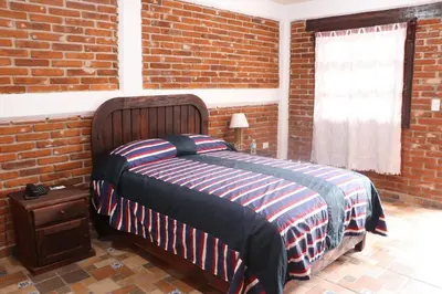 Cama o camas de una habitación en Hotel Campestre El Rinconcito de Chigna