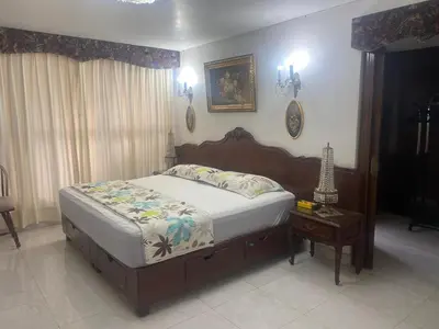 Cama o camas de una habitación en Viveros de Coyoacan