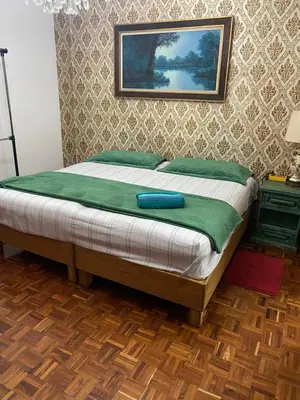 Cama o camas de una habitación en Viveros de Coyoacan