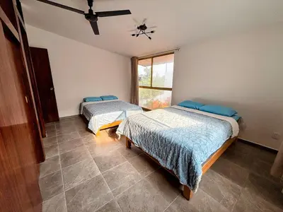 Cama o camas de una habitación en Espectacular casa con jardín y alberca privada
