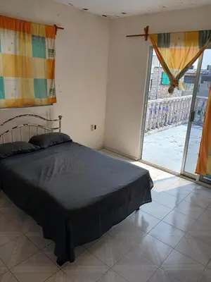Cama o camas de una habitación en Alojmiento centrico y cerca de la playa