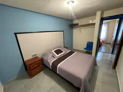 Cama o camas de una habitación en Casa cerca de Plaza de Toros de Apizaco y del Centro Deportivo de Alto Rendimiento