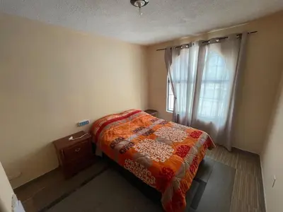 Cama o camas de una habitación en Casa cerca de Plaza de Toros de Apizaco y del Centro Deportivo de Alto Rendimiento