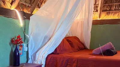 Cama o camas de una habitación en El Chiringuito, Mermejita
