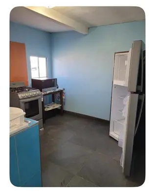 Una cocina o zona de cocina en BANI departamento