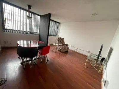 Zona de estar de Departamento comodo y centrico en Portales