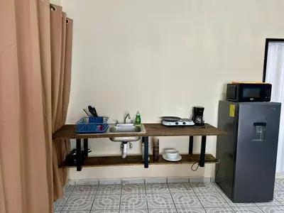 Una cocina o zona de cocina en Puerto 201 ROOMS