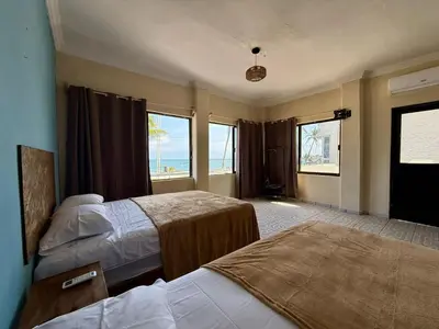 Cama o camas de una habitación en Puerto 201 ROOMS