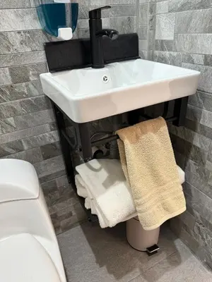 Un baño de Suite La Lomita #3 Climatizada