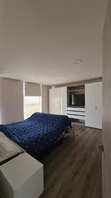 Cama o camas de una habitación en Departamento en Angelópolis