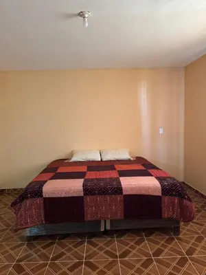 Cama o camas de una habitación en Hospedaje Casa Noah