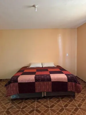 Cama o camas de una habitación en Hospedaje Casa Noah