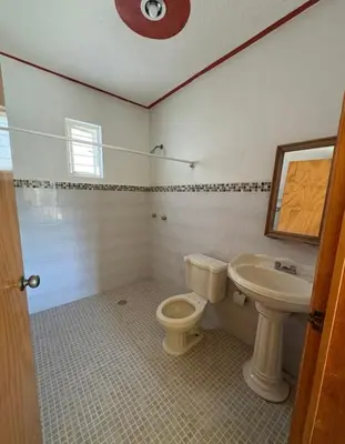 Un baño de Casa Reforma Descanso y Bienestar en Oaxaca