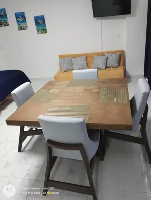 Zona de estar de Suite Frontal a Pie de Playa con Terraza Panorámica