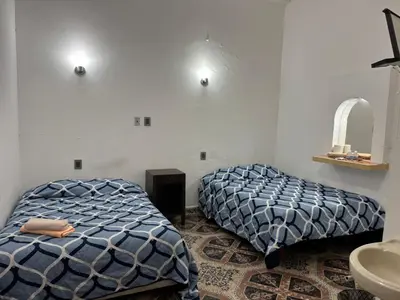 Cama o camas de una habitación en Habitaciones Climar