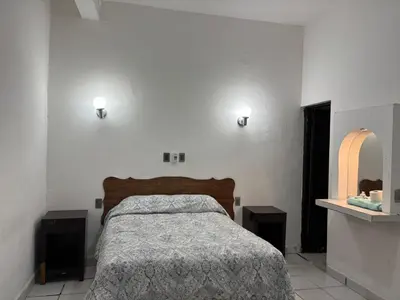 Cama o camas de una habitación en Habitaciones Climar